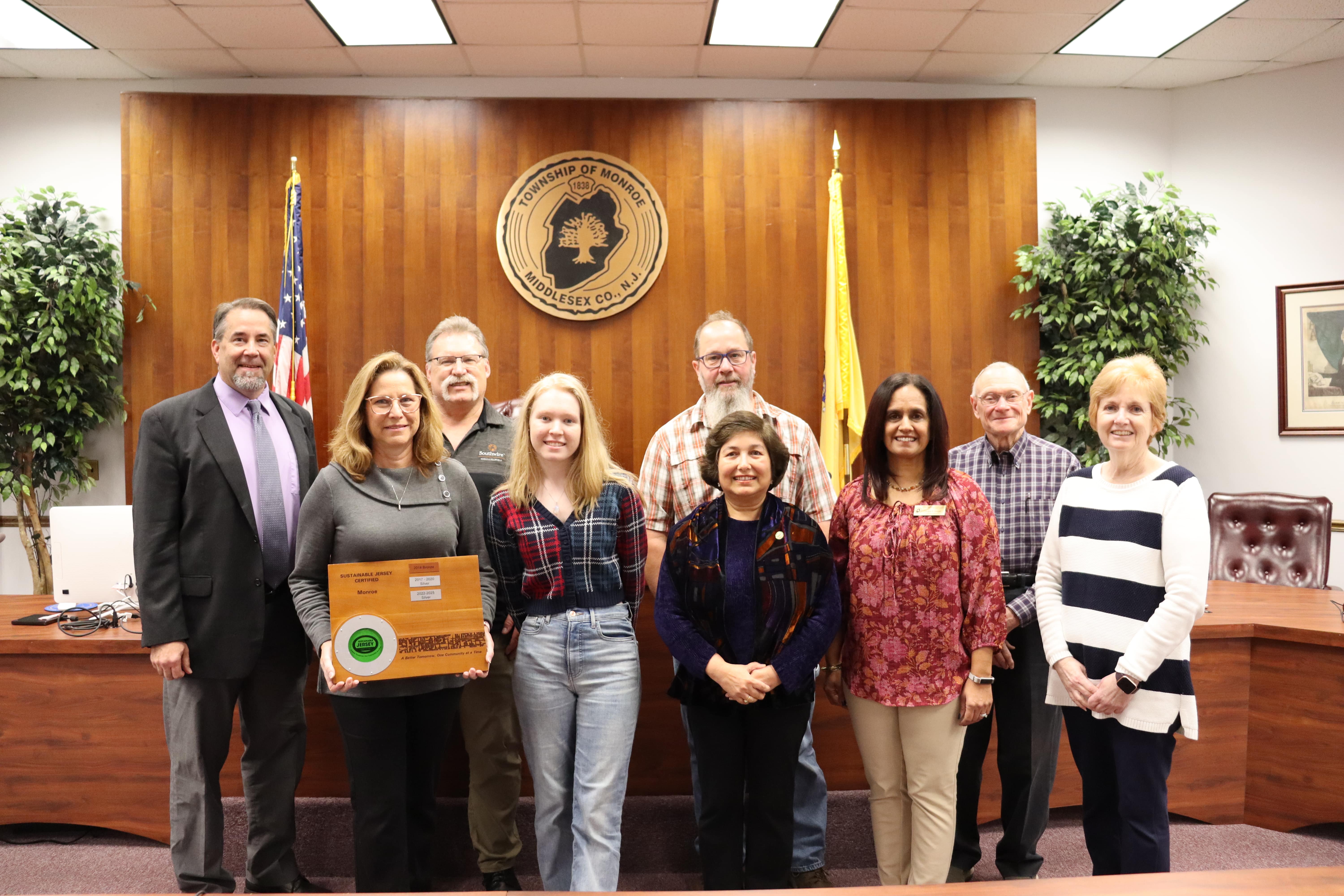 SJ MONROE silver group photo in Courtroom 1 min